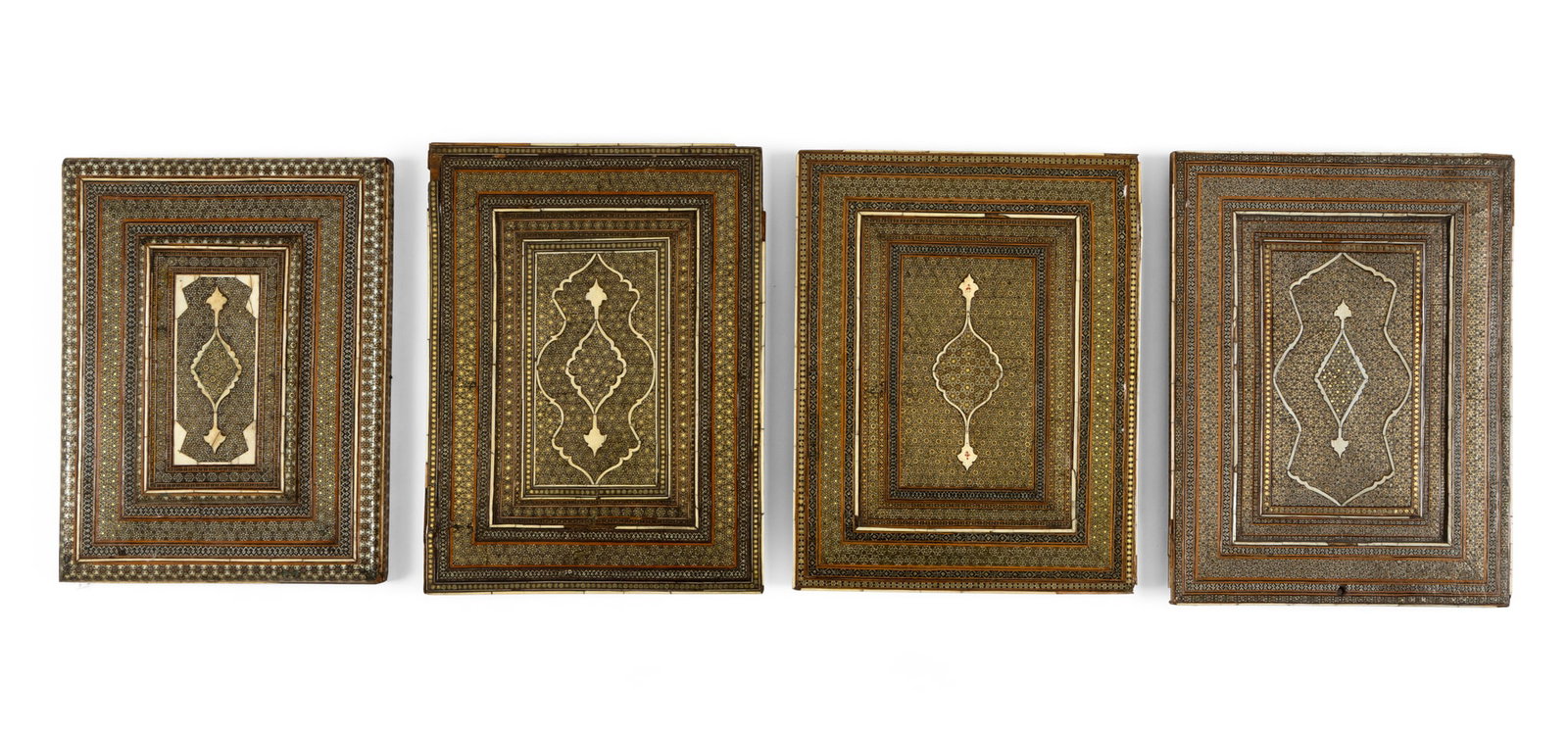 A GROUP OF QAJAR KHATAMKARI FRAMES: A GROUP OF QAJAR KHATAMKARI FRAMES PERSIA, 19TH CENTURY comprising three frames and one lid, each rectangular with surfaces inlaid with micro-mosaic segments of bone, brass and stained wood, forming g