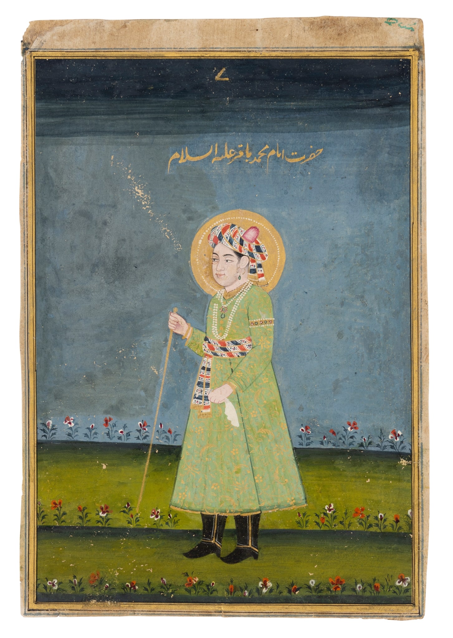 PRINCE LEANING ON A STAFF: PRINCE LEANING ON A STAFF MUGHAL INDIA, CIRCA 1780 gouache on paper heightened in gold, the jewelled nimbate prince depicted standing facing to the left, dressed in a green jama and striped red and bl