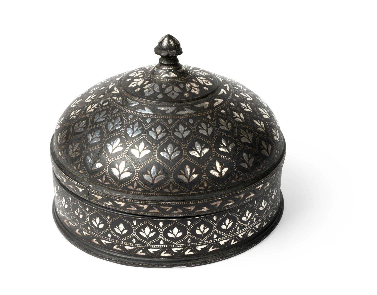 A BIDRI SILVER-INLAID SPICE BOX OR PANDAN: A BIDRI SILVER-INLAID SPICE BOX OR PANDAN INDIA, BIDAR OR DECCAN, 18TH CENTURY of circular form, the sloping domic lid with bud finial, the body decorated overall with a lattice design composed of tre
