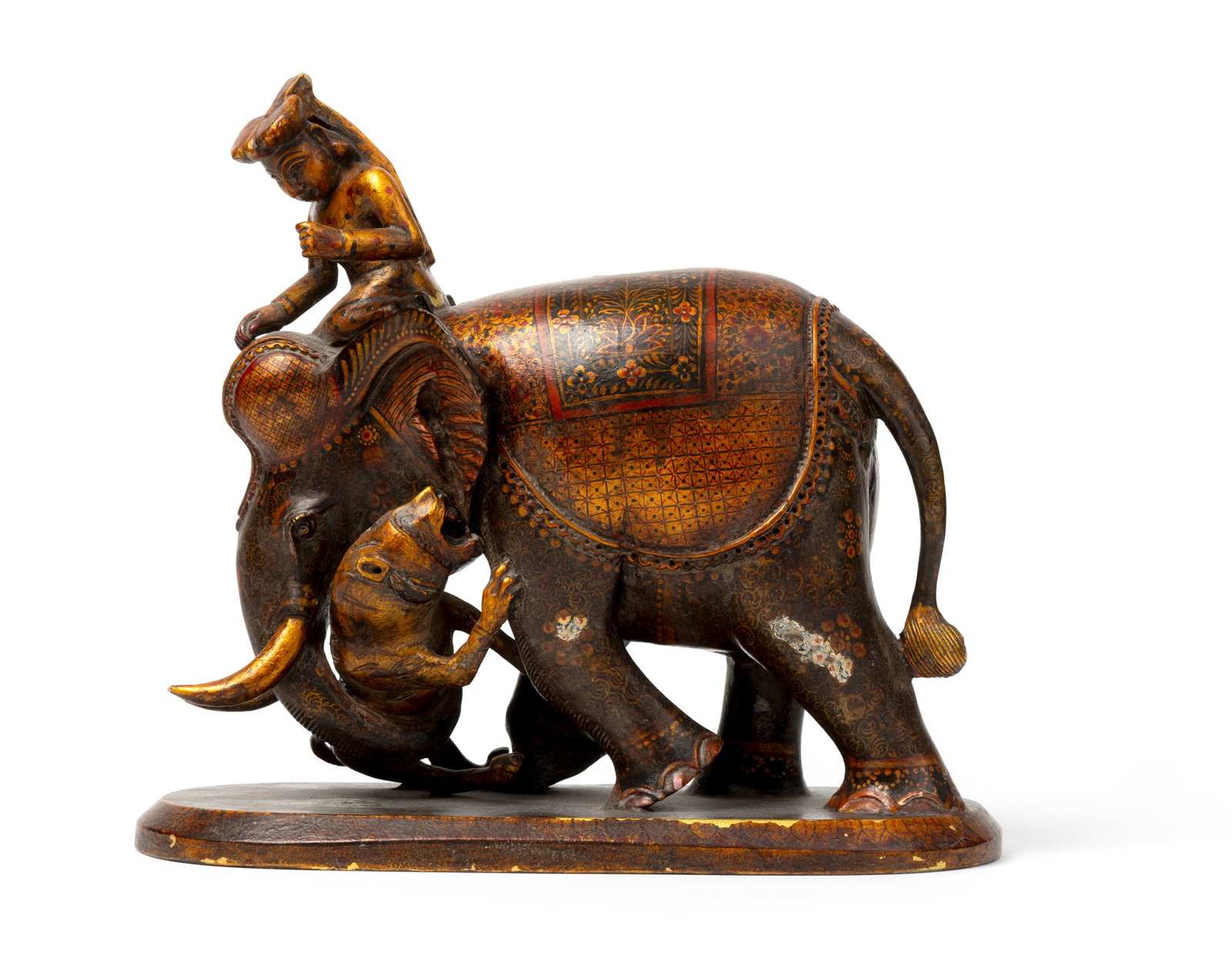 AN ELEPHANT WITH HIS MAHOUT WRESTLING A TIGER: AN ELEPHANT WITH HIS MAHOUT WRESTLING A TIGER SOUTH INDIA, PROBABLY MYSORE, CIRCA 1800 the carved wood elephant, mahout and tiger, all lacquered in gilt and polychrome, showing the elephant in movemen