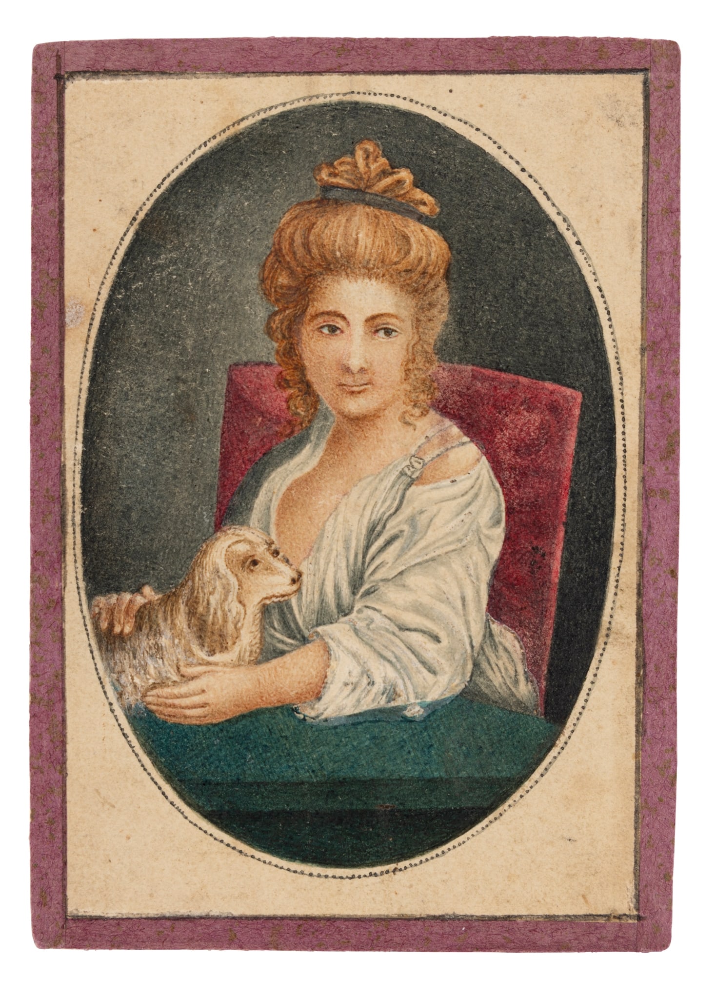 AN OVAL PORTRAIT OF A LADY STROKING HER DOG: AN OVAL PORTRAIT OF A LADY STROKING HER DOG INDIA, BENGAL, CALCUTTA, CIRCA 1840 gouache on paper, depicting a mistress with her thick red hair tied up above her head, sitting on a burgundy velvet chai