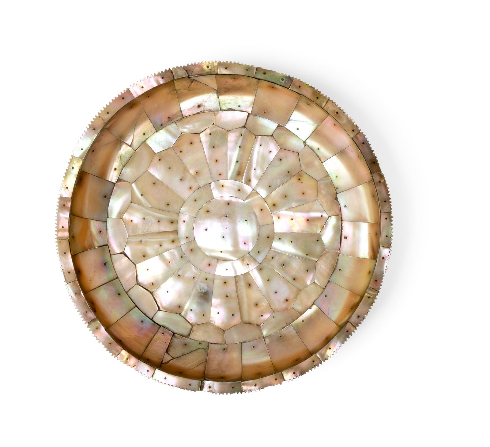 AN INDO-PORTUGUESE MOTHER-OF-PEARL DISH: AN INDO-PORTUGUESE MOTHER-OF-PEARL DISH INDIA, GUJARAT, EARLY 17TH CENTURY of shallow rounded form with a narrow flat rim on a short brass foot ring, composed of geometric mother-of-pearl sections for