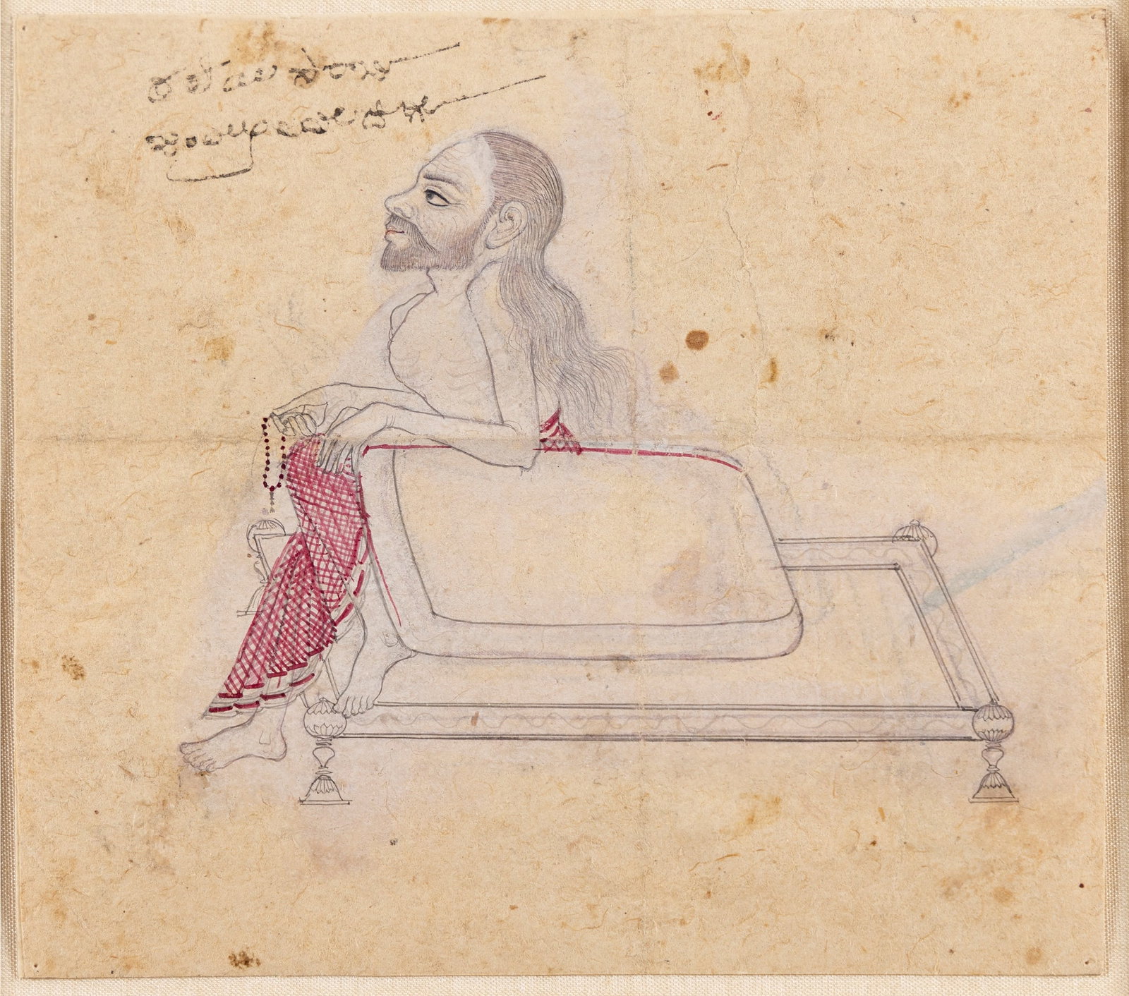 A PORTRAIT OF A HUNCHBACK: A PORTRAIT OF A HUNCHBACK INDIA, KARNATAKA, POSSIBLY SHORAPUR, CIRCA 1840 pen and ink and opaque watercolour on paper, two line inscription in Telgu, on the backboard are several hand written notes by