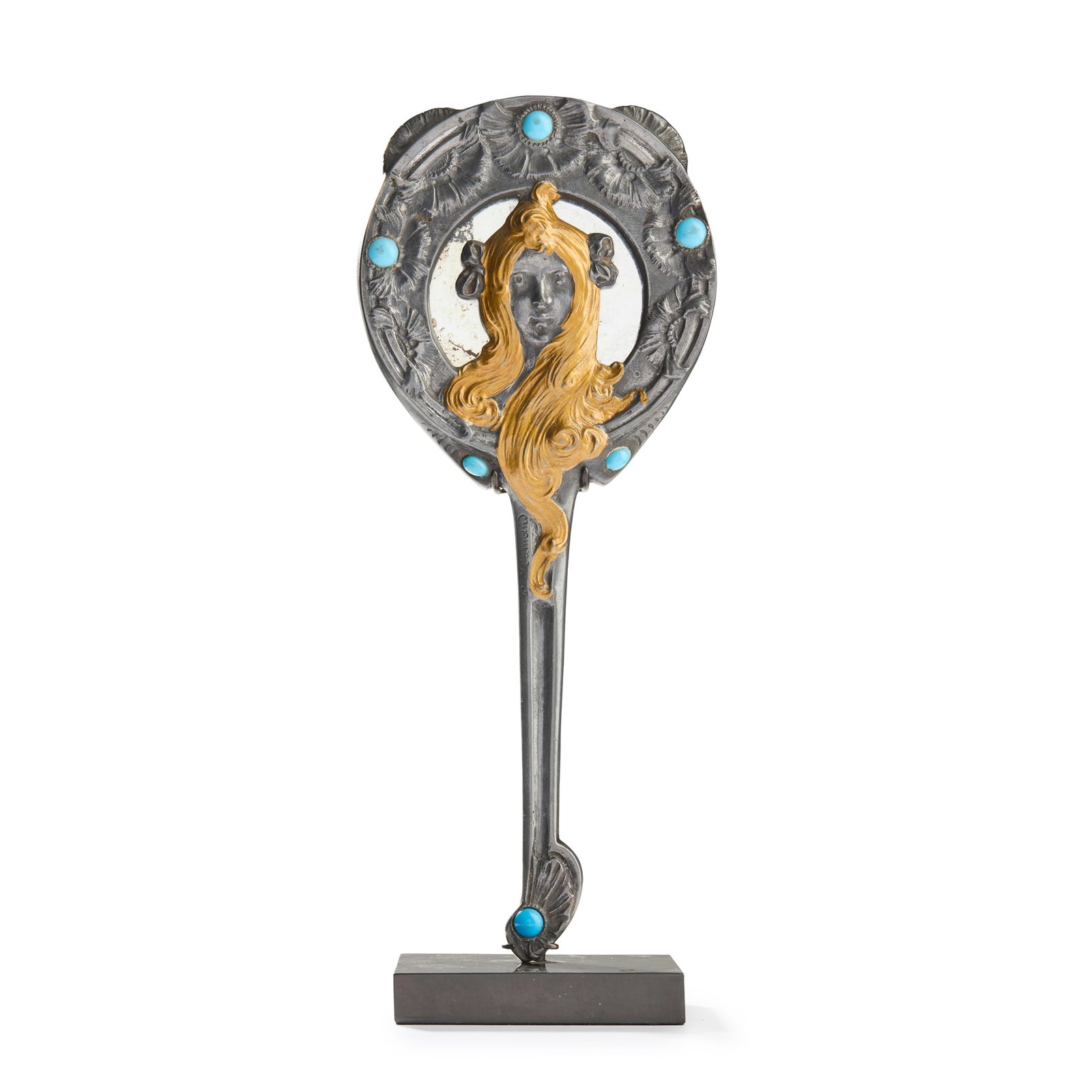 GEORGES FLAMAND (1895-1925): GEORGES FLAMAND (1895-1925) FIGURAL HAND-MIRROR circa 1900patinated and gilt metal inset with turquoise coloured cabochons, with later mirrored glass and standsigned in cast G. Flamand(2) 23.8cm high