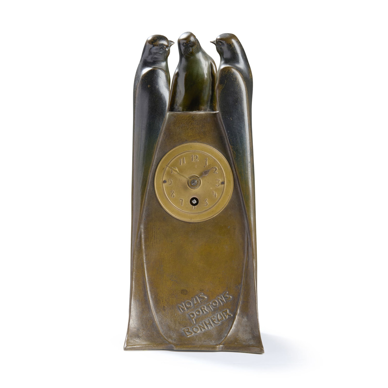 ‡ ANTON PUCHEGGER (1878-1917): ANTON PUCHEGGER (1878-1917) NOUS PORTONS BONHEUR TIMEPIECE circa 1910patinated and cold-painted bronze, gilt metal dial, and key moulded NOUS PORTONS BONHEUR, signed A. PUCHEGGER,1056(2) 23cm