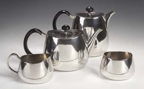 A David Mellor 'Pride' electroplated tea service: A David Mellor 'Pride' electroplated tea service, designed c. 1959 for Walker and Hall, comprising a teapot and cover, a hot water jug and cover, a milk jug and a sugar bowl, each with stamped marks 5