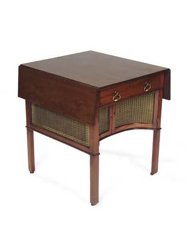 .An early George III mahogany drop flap breakfast: An early George III mahogany drop flap breakfast table, in the manner of Thomas Chippendale, the rectangular hinged top above a single drawer raised above a lower compartment with wirework sides and t