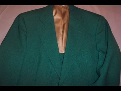 GREEN SPORTS JACKET An emerald green two-button sp: GREEN SPORTS JACKET An emerald green two-button sports jacket owned and worn by Billy, during the 1990s onwards-almost becoming his trademark, especially on St. Patrick's Day! Good condition. 