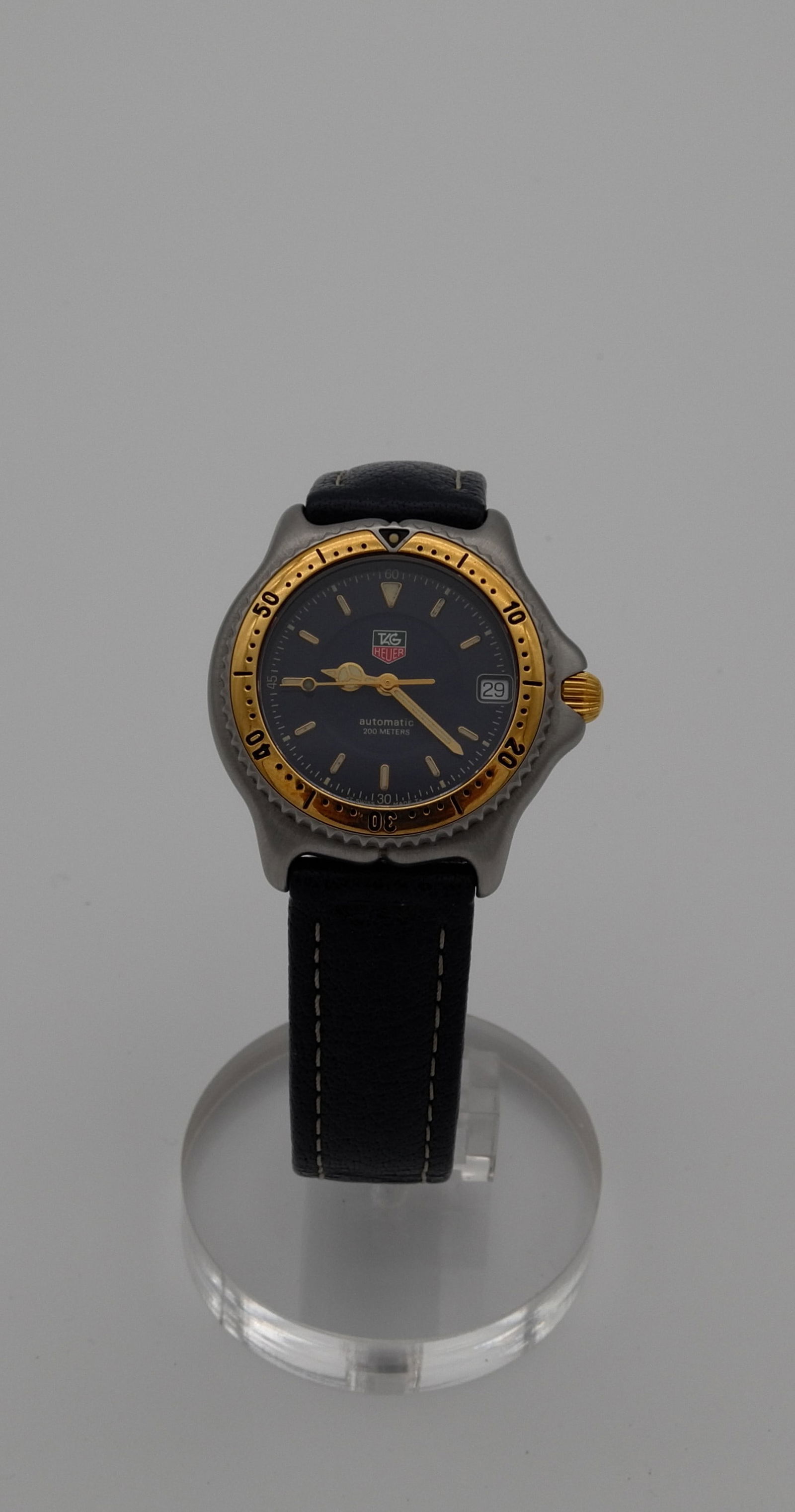 TAG HEUER AUTOMATIC SWISS WATCH WITH GOLD BAZEL (1 of 7)