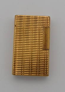 S. T. DUPONT 20 MICRON/18KT GOLD GAS LIGHTER PARIS FRANCE: S.T. DUPONT 20 MICRON/18KT GOLD GAS LIGHTER, PARIS. FRANCE. Size: H-58mmx W 35mm. Condition: Not Tested at the time of inspection. Please see pictures. Provenance: NYC prominent watch collector. Note-