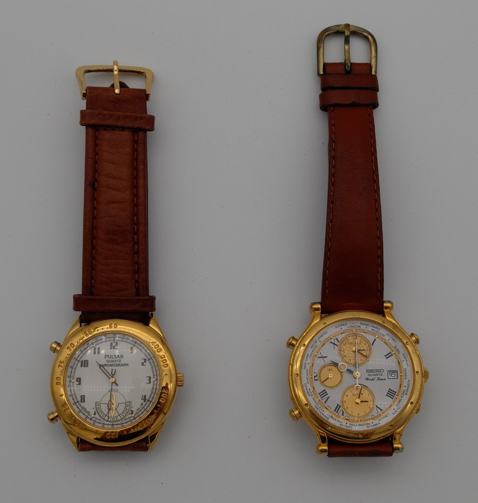 LOT OF 2 WATCHES: SEIKO WORLD TIMER QUARTZ & PULSAR CHRONOGRAPH QUARTZ WATCHES: LOT OF 2 MEN WATCHES: 1. SEIKO WORLD TIMER QUARTZ men JAPAN Watch and 2. PULSAR CHRONOGRAPH QUARTZ men Watch. Size: Case app.1.- 39mm, 2.-36mm. excluding crowns. Condition: NOT working at the time of