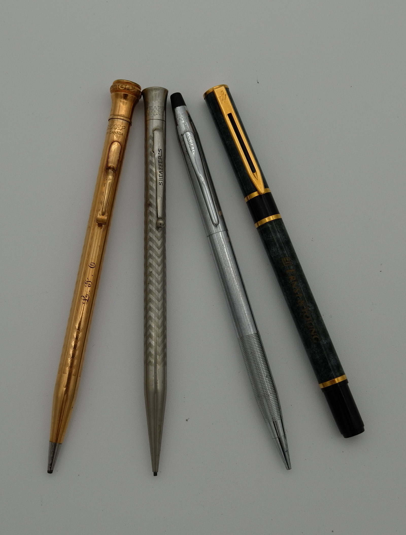 LOT OF 4 PEN/PENCILS: LOT OF 4 PEN/PENCILS including WATERMAN and CROSS pens, SHEAFFER'S and WAHL GOLD FILLED pencils. Size: app. 5" each. Condition: Please see pictures. Provenance: NYC prominent watch collector. Please n