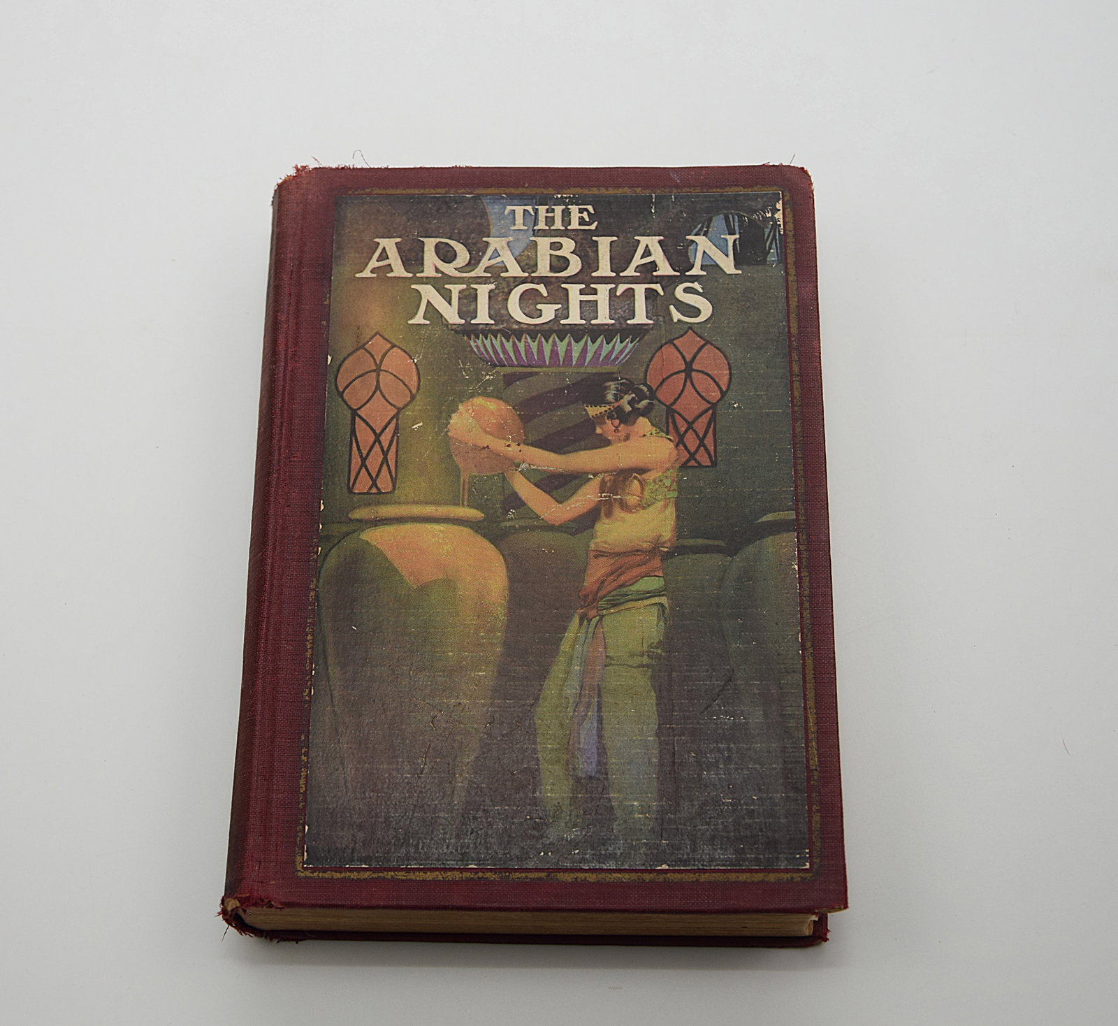 THE ARABIAN NIGHTES ANTIQUE BOOK 1924: THE ARABIAN NIGHTES ANTIQUE BOOK 1924. HARDCOVER. PUBLISHER: The John C. Winston Company Copyright 1924. RARE AND OUT OF PRINT BOOK. Size: 8 3/4 x 6 1/4 in. overall. All measurements are approximate. 