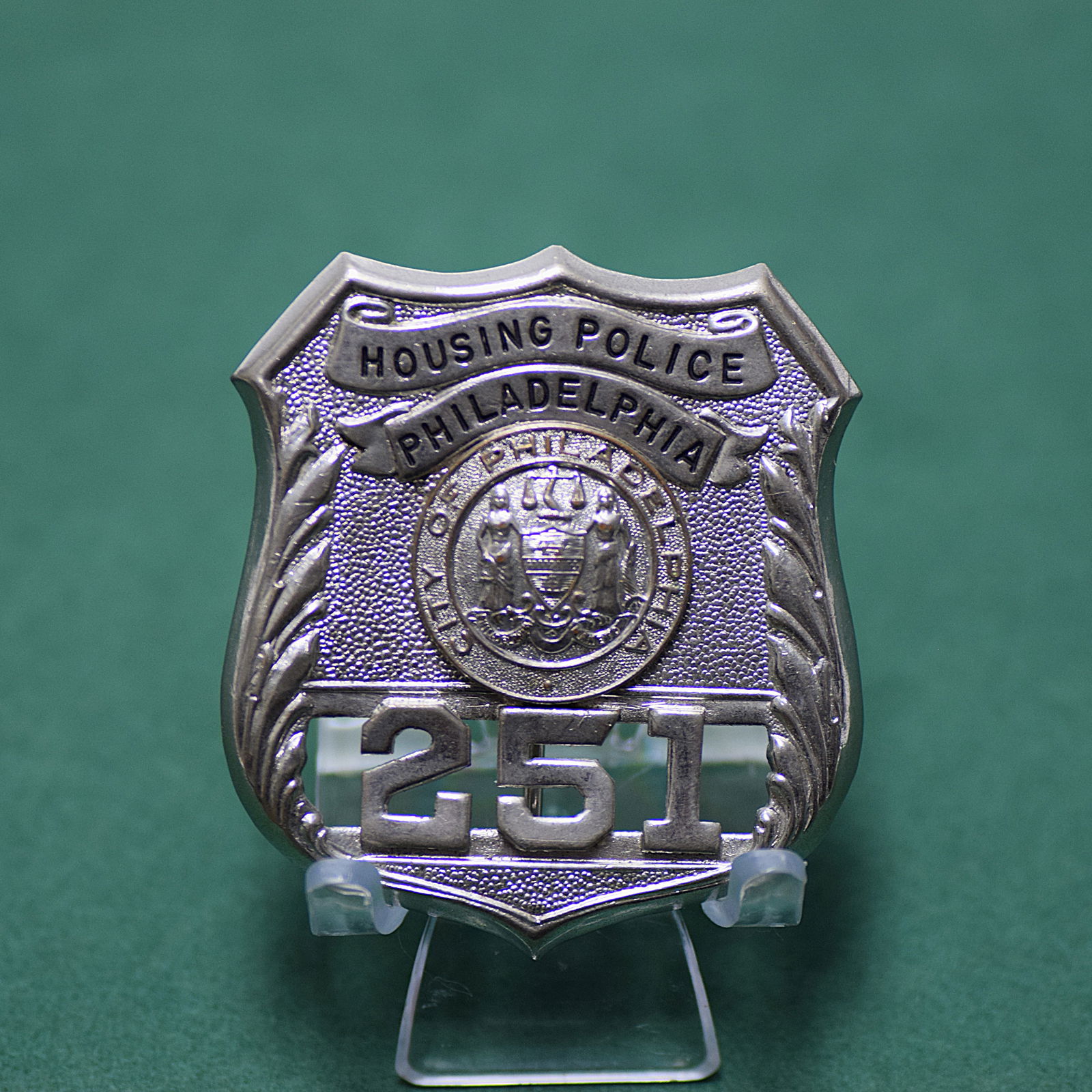 OBSOLETE PHILADELPHIA HOUSING POLICE BADGE: OBSOLETE PHILADELPHIA HOUSING POLICE BADGE. Number: 251. Size: 2 3/8 X 2 1/4 in. All measurements are approximate. Condition: Please see pictures. Provenance: NY State prominent military collector. No