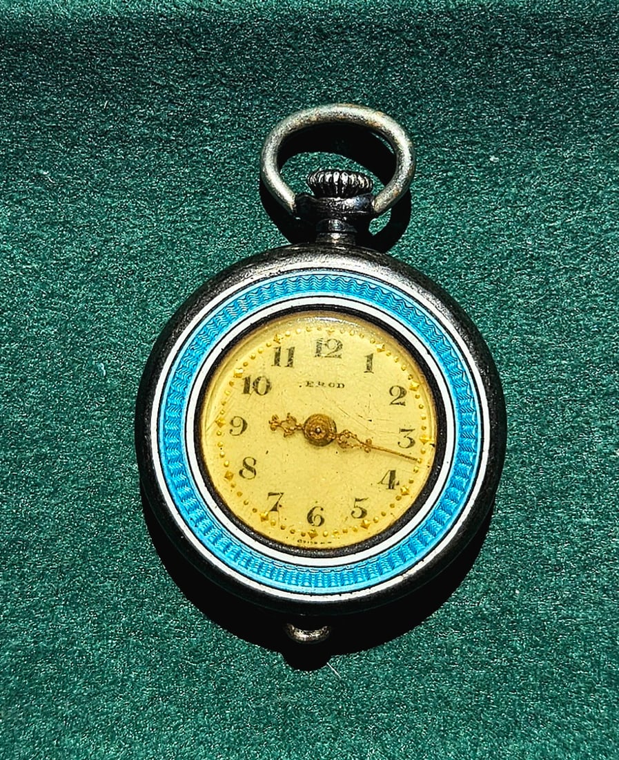 ANTIQUE STERLIG SILVER BLUE GUILLOCHE ENAMEL LADIES POCKET/PENDANT WATCH: ANTIQUE STERLIG SILVER BLUE GUILLOCHE ENAMEL LADIES POCKET/PENDANT WATCH. MADE BY M. NICOLETE & Co., 7 Jewels. Size: Case app. 25mm excluding crown. Condition: Not working at the time of inspection. P