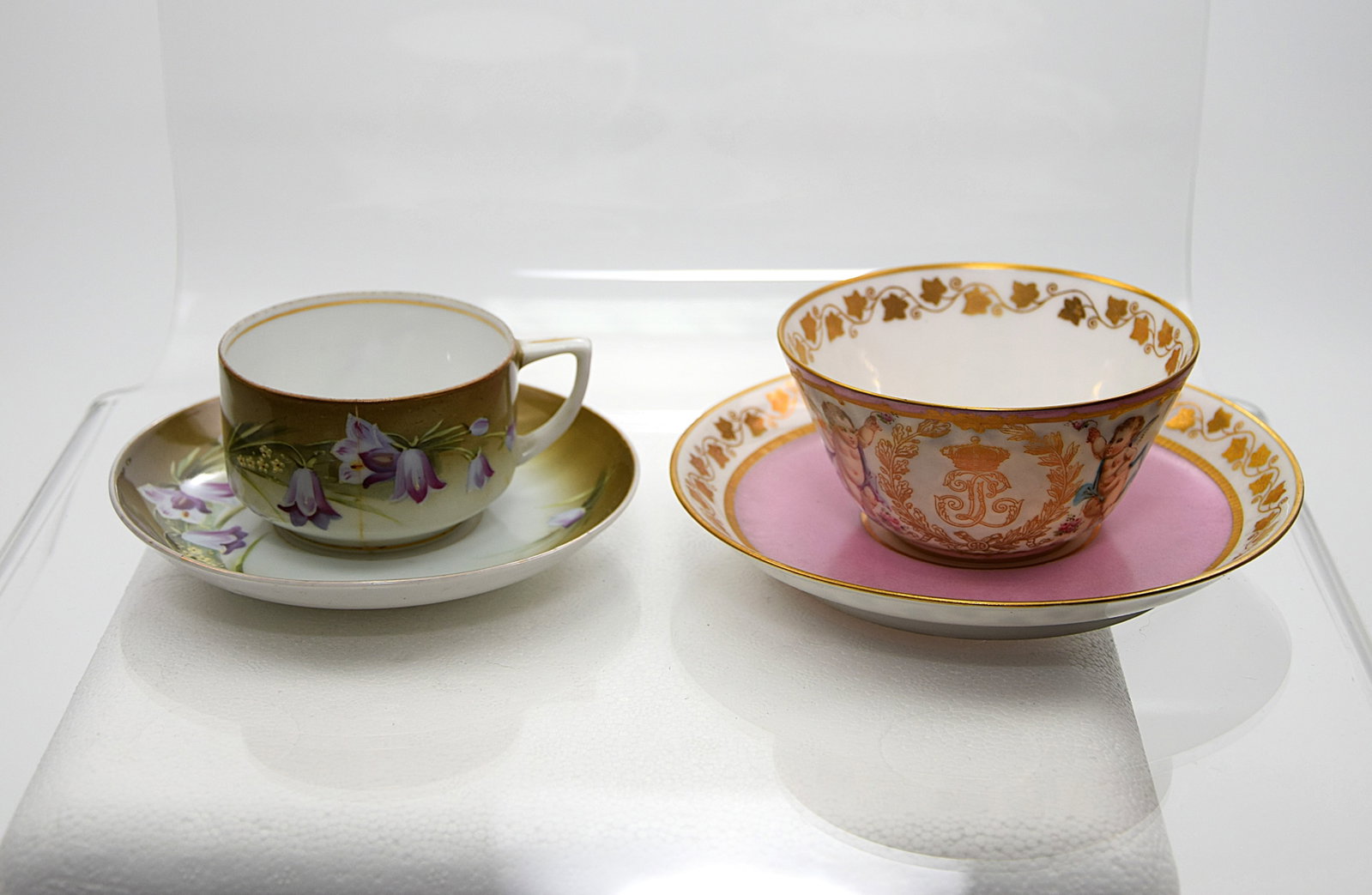 IMPERIAL RUSSIAN CUP AND SAUCER AND FRENCH CUP AND SAUCER: LOT OF 2 -1. IMPERIAL RUSSIAN CUP AND SAUCER BY GARDNER (Red Mark). CUP HAS A HAIR LINE CRACK. 2. SEVRES FRENCH CUP AND SAUCER C.1844. Company Mark of CHATEAU DES TULLERIES. Size: 1. cup is 1 1/2 in. 