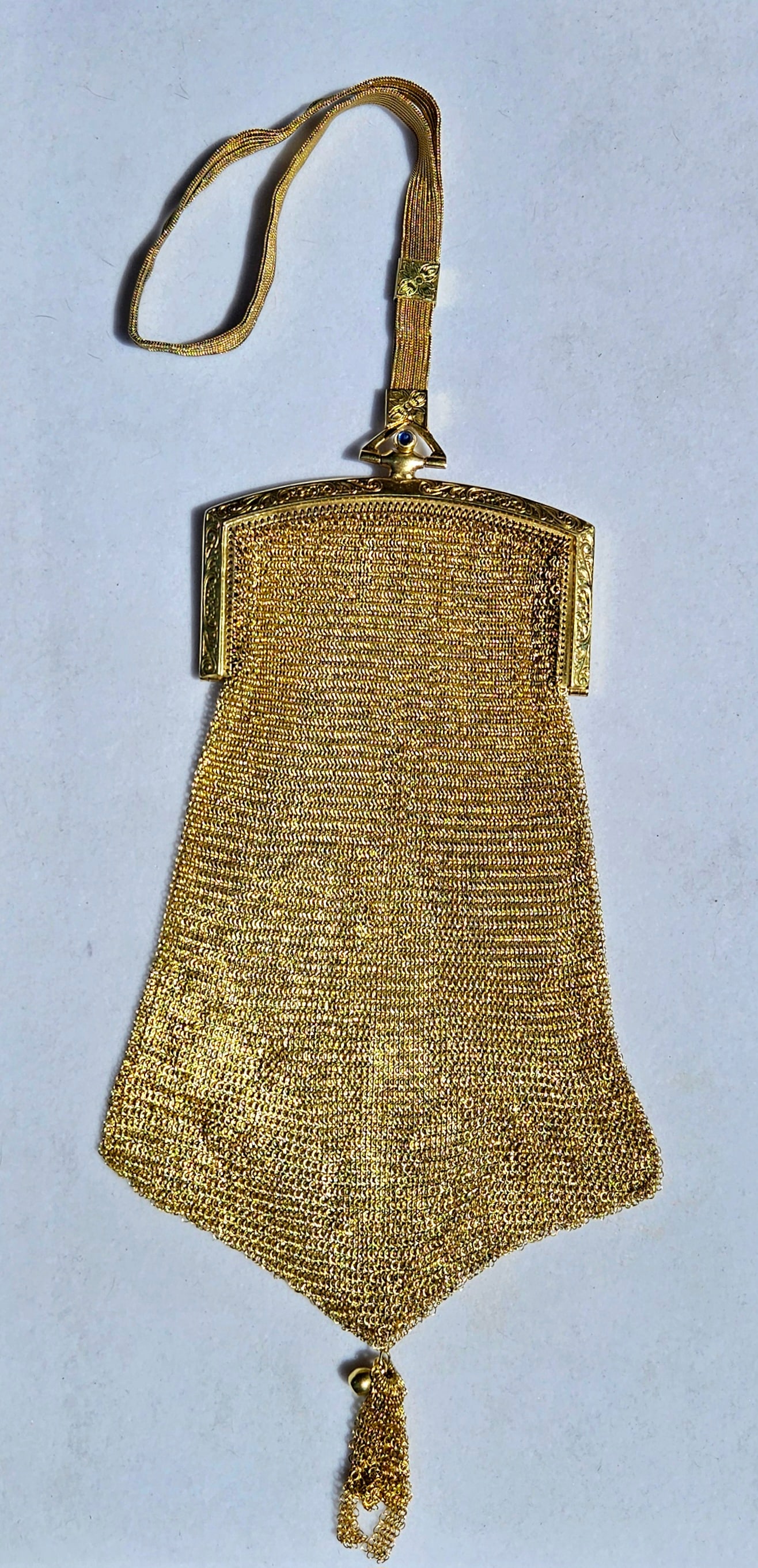 ANTIQUE WHITING AND DAVIS GOLD TONE METAL MESH BAG: ANTIQUE WHITING AND DAVIS GOLD TONE METAL MESH BAG. Size: total length 8 1/2 x 3 in. All measurements are approximate. Condition: Please see pictures. Provenance: NY State prominent art collector. Not