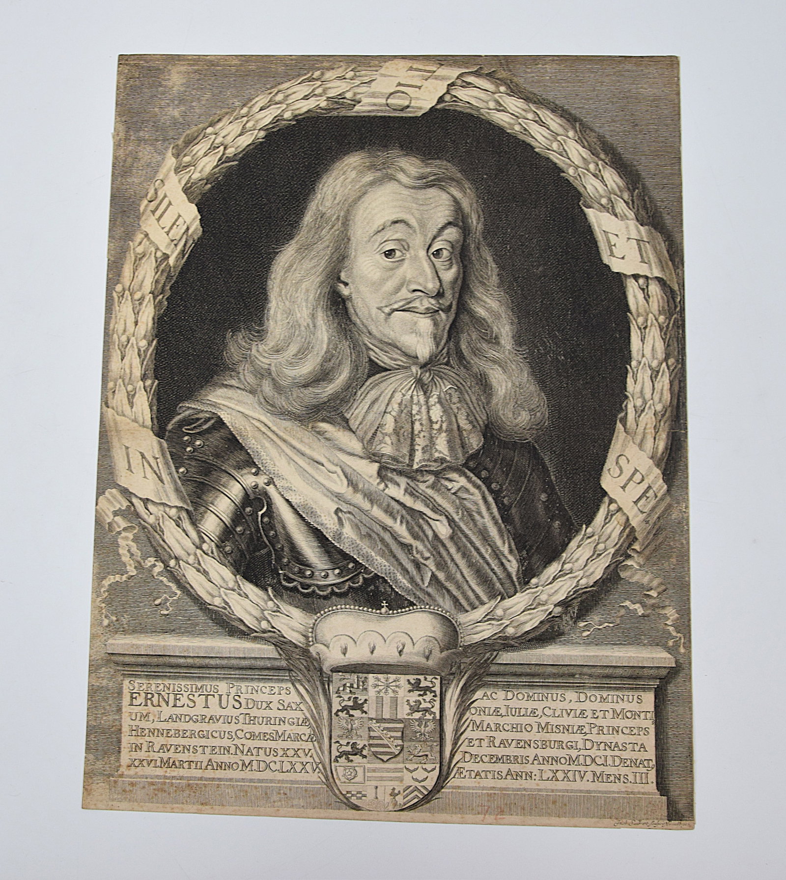17TH CENTURY GERMAN ENGRAVING OF ERNEST I, DUKE OF SAXONY (ERNESTUS DUX SAXONIAE): A FINE BLACK AND WHITE COPPERPLATE ENGRAVING PORTRAIT OF ERNEST I, DUKE OF SAXONY, SHOWN WITHIN A LAUREL WREATH AND ARMOR, WITH HERALDIC COAT OF ARMS AND LATIN INSCRIPTION BELOW, ENGRAVED BY JACOB SAN