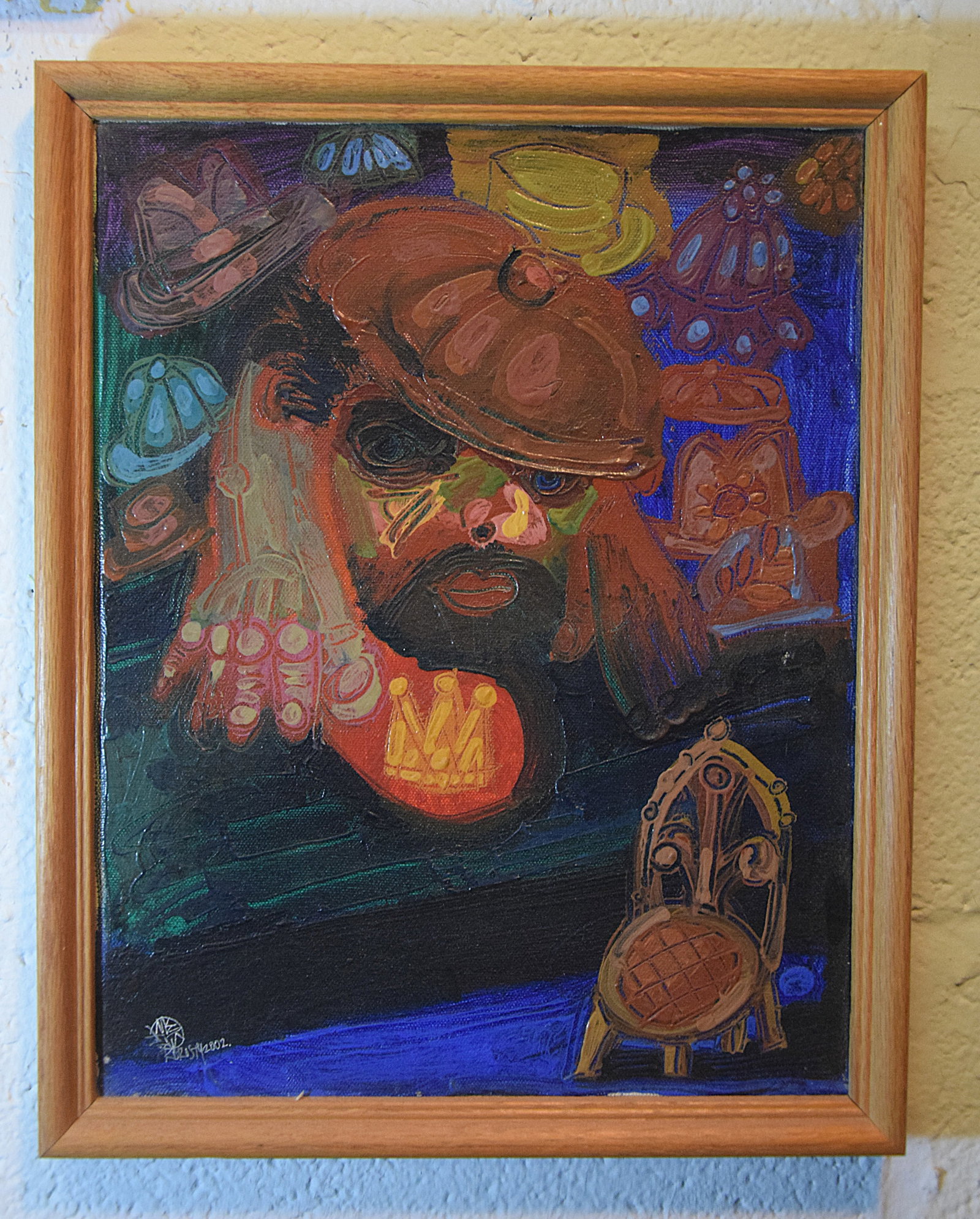 VIBRANT FIGURAL OIL PAINTING THE CROWN DEALER SIGNED M KOROSTY 2002 CONTEMPORARY AMERICAN: BOLD EXPRESSIONIST FIGURAL COMPOSITION EXECUTED IN OIL ON CANVAS BY MICHAEL KOROSTY, SIGNED AND DATED 2002, DEPICTING A STYLIZED BEARDED FIGURE SURROUNDED BY HATS AND SYMBOLIC OBJECTS INCLUDING A CROW
