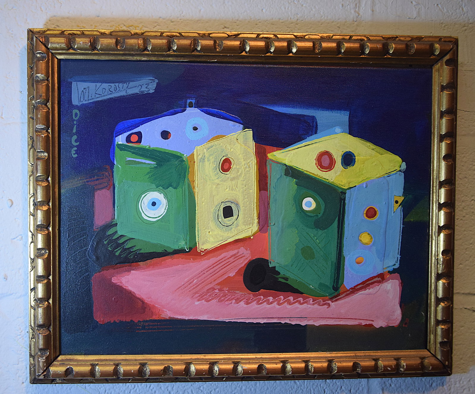 CONTEMPORARY ABSTRACT “DICE" SIGNED M KOROSTY 2023 ACRYLIC ON CANVAS: BOLD AND PLAYFUL CONTEMPORARY ABSTRACT COMPOSITION FEATURING GEOMETRIC, DICE-LIKE FORMS RENDERED IN VIVID BLOCKS OF GREEN, YELLOW, BLUE, AND RED SET AGAINST A DEEP, MOODY BACKGROUND; THE FORMS ARE ACC