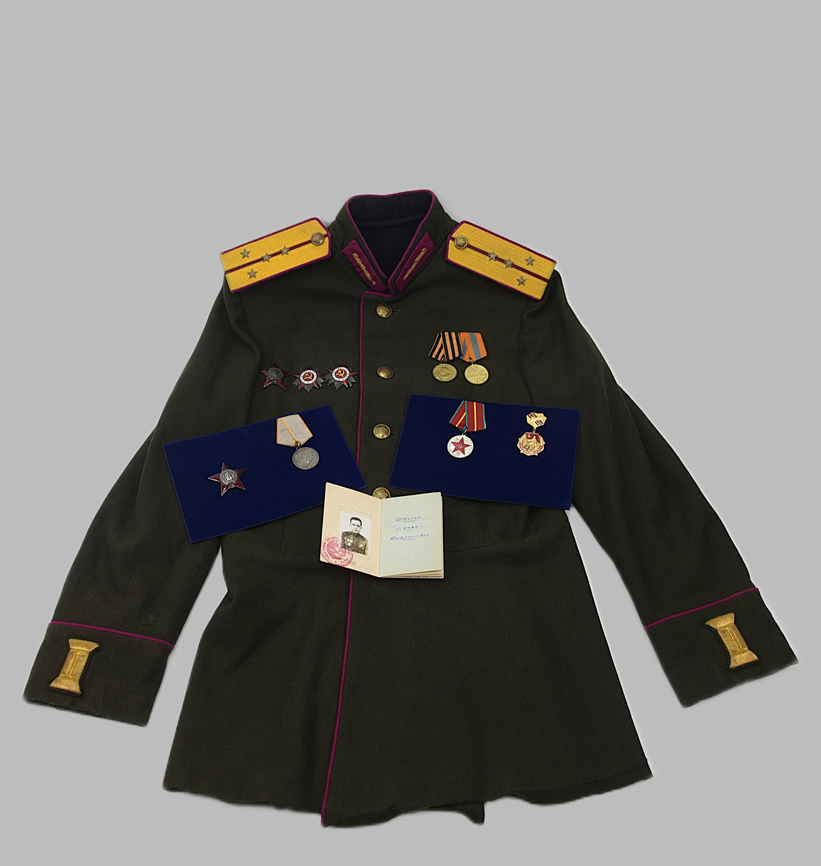 SOVIET OFFICER UNIFORM AND COMPLETE AWARD GROUPING MIKHAIL I. SHTUKIN 529TH RIFLE REGIMENT WWII: COMPLETE AND HIGHLY ATTRIBUTED SOVIET RED ARMY OFFICER GROUPING CENTERED ON SENIOR LIEUTENANT MIKHAIL I. SHTUKIN, COMMANDER OF A MACHINE GUN PLATOON, 529TH RIFLE REGIMENT, 163RD RIFLE DIVISION, COMPRI