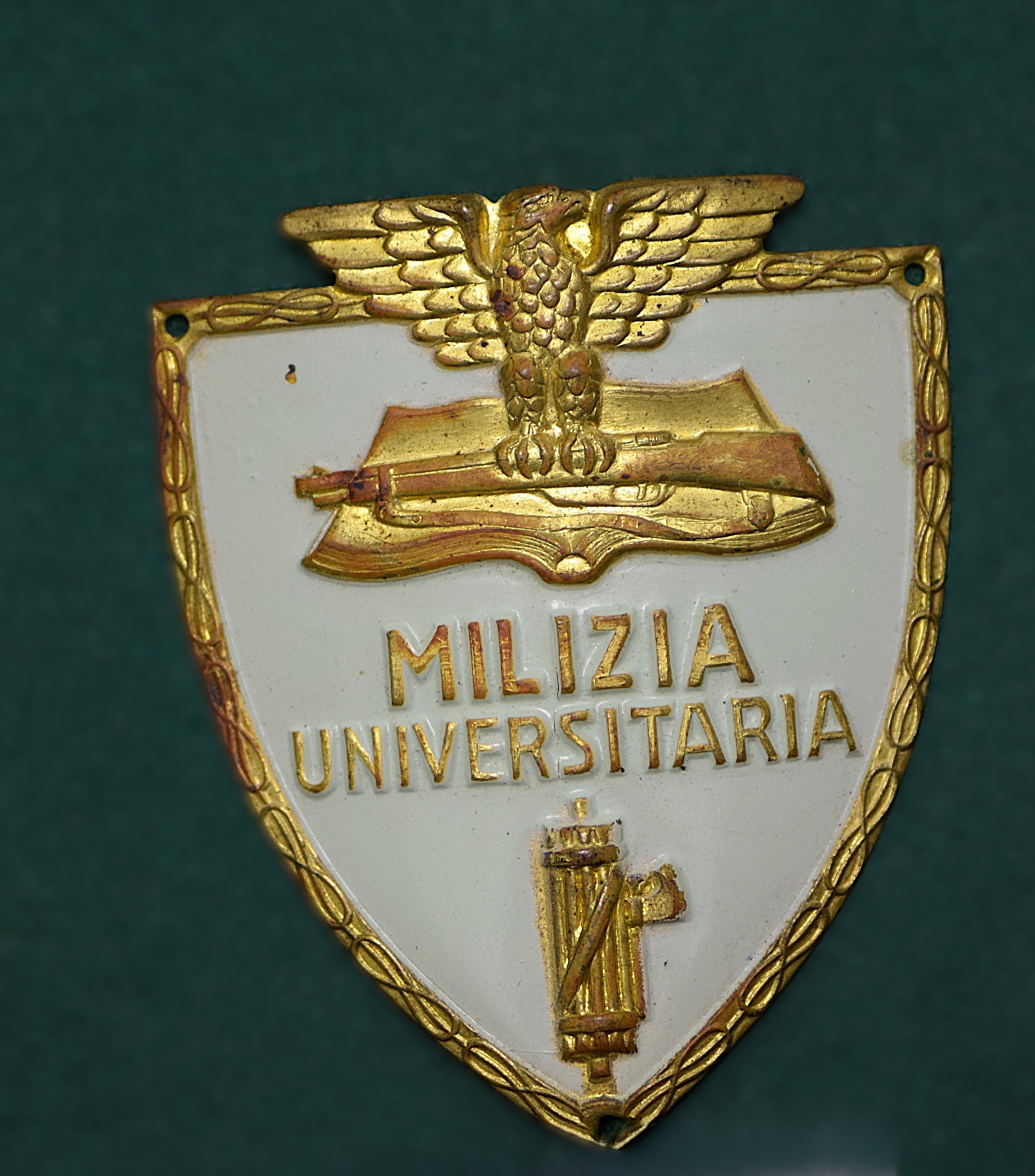 WWII ITALIAN FASCIST SHIELD: WWII ITALIAN FASCIST SHIELD. Original. Size: 2 3/4 x 2 in. All measurements are approximate. Condition: Please see pictures. Provenance: NY prominent military collector. Note- Please note the absence 