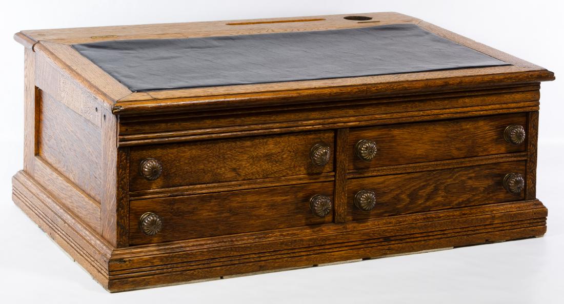 Oak Spool Cabinet by J&P Coats: Oak Spool Cabinet by J&P Coats Having a slanted hinged top over four spool drawers; together with a cast iron upholstered stool Height: 12.00 inches, Width: 29.75 inches, Depth: 20.00 inches (spool ca