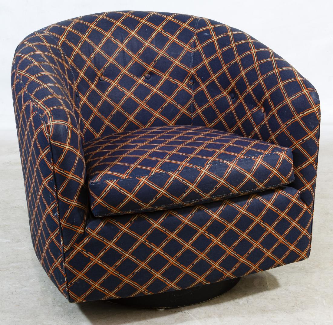 MCM Style Upholstered Club Chair by Milo Baughman: MCM Style Upholstered Club Chair by Milo Baughman Swivel rocker with black fabric having a tan and orange crisscross pattern Height: 28.00 inches, Width: 29.00 inches, Depth: 29.00 inches Category: Fu