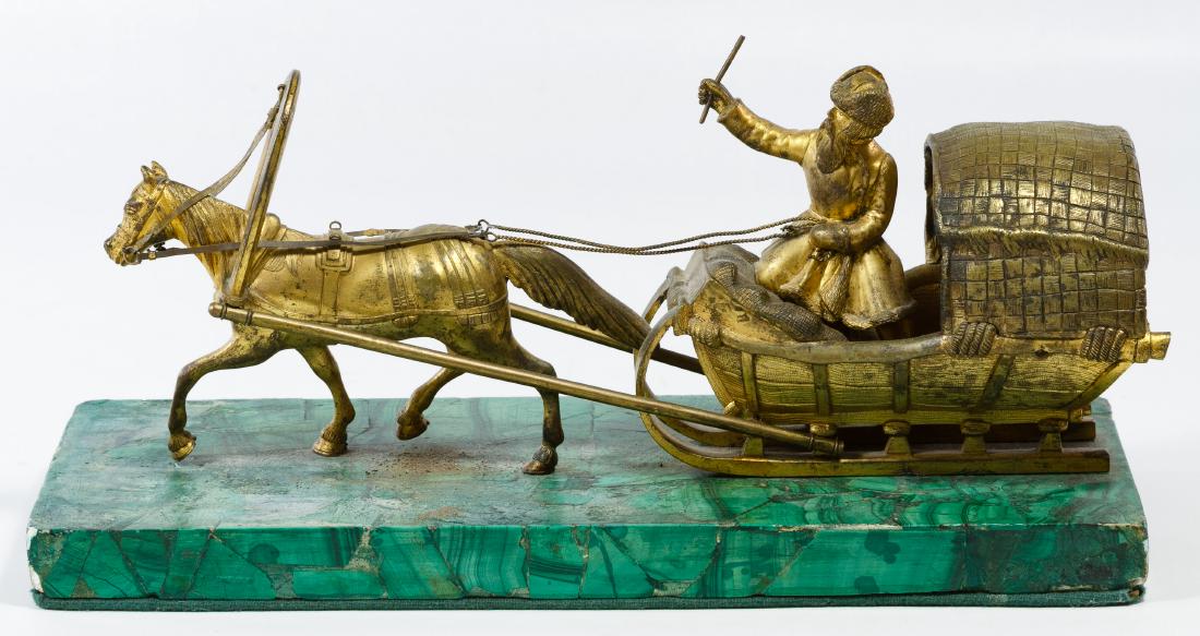 Russian Style Gilt Metal Horse and Sled: Russian Style Gilt Metal Horse and Sled Having a cast metal statue of a Cossack style sleigh driver with horse mounted onto a Malachite style plaster and stone plinth; unmarked Height: 6.00 inches, Le