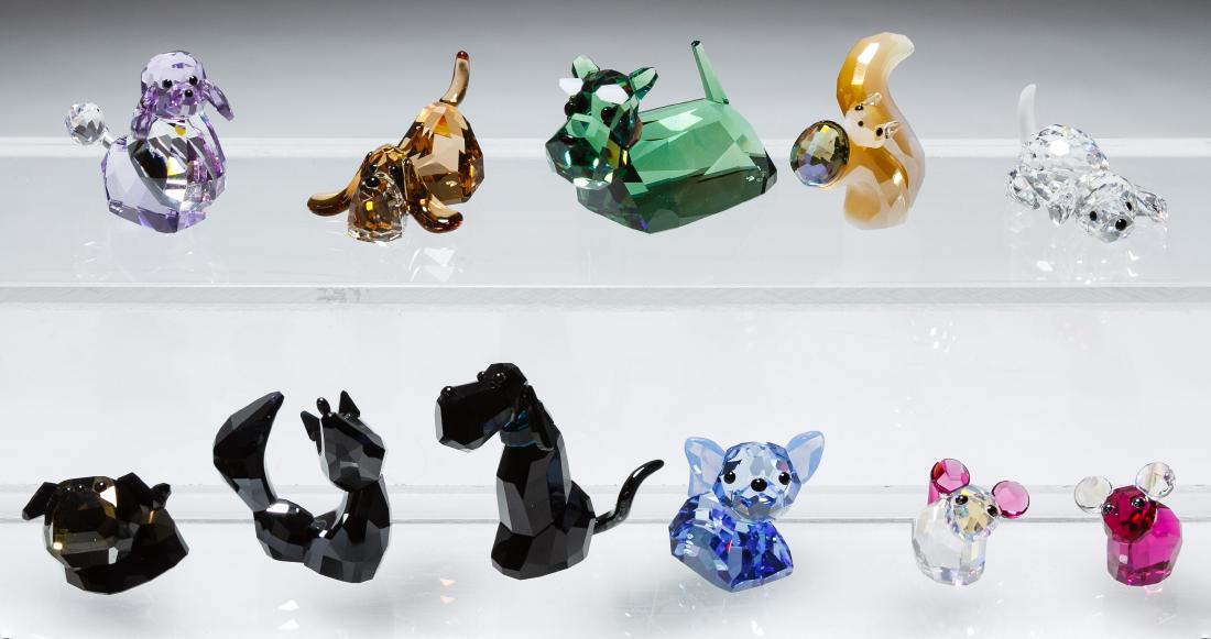Swarovski Crystal Dog Figurine Assortment: Swarovski Crystal Dog Figurine Assortment Eight dog figurines; together with a mouse and squirrel figurine; all marked on the bottom Height: 2.00 inches (tallest) Category: Crystal & Glass > Swarovski