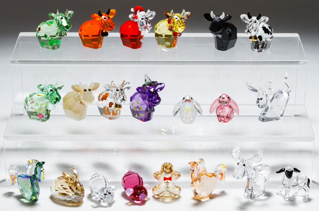 Swarovski Crystal Farm Animal Figurine Assortment: Swarovski Crystal Farm Animal Figurine Assortment Twenty-one pieces including 'Mo' and 'Lovlots' cows; all marked on bottom Height: 2.00 inches (tallest) Category: Crystal & Glass > Swarovski Shipping