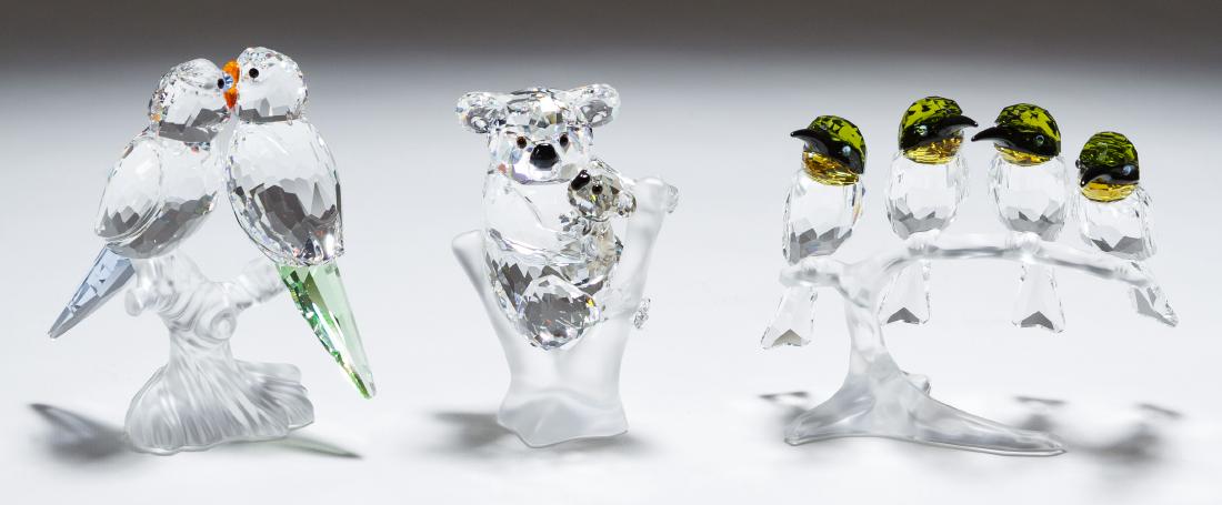 Swarovski Crystal Figurine Assortment: Swarovski Crystal Figurine Assortment Three items including parrots, koala and birds, all on frosted branches; all marked on bottom Height: 3.00 inches (tallest) Category: Crystal & Glass > Swarovski