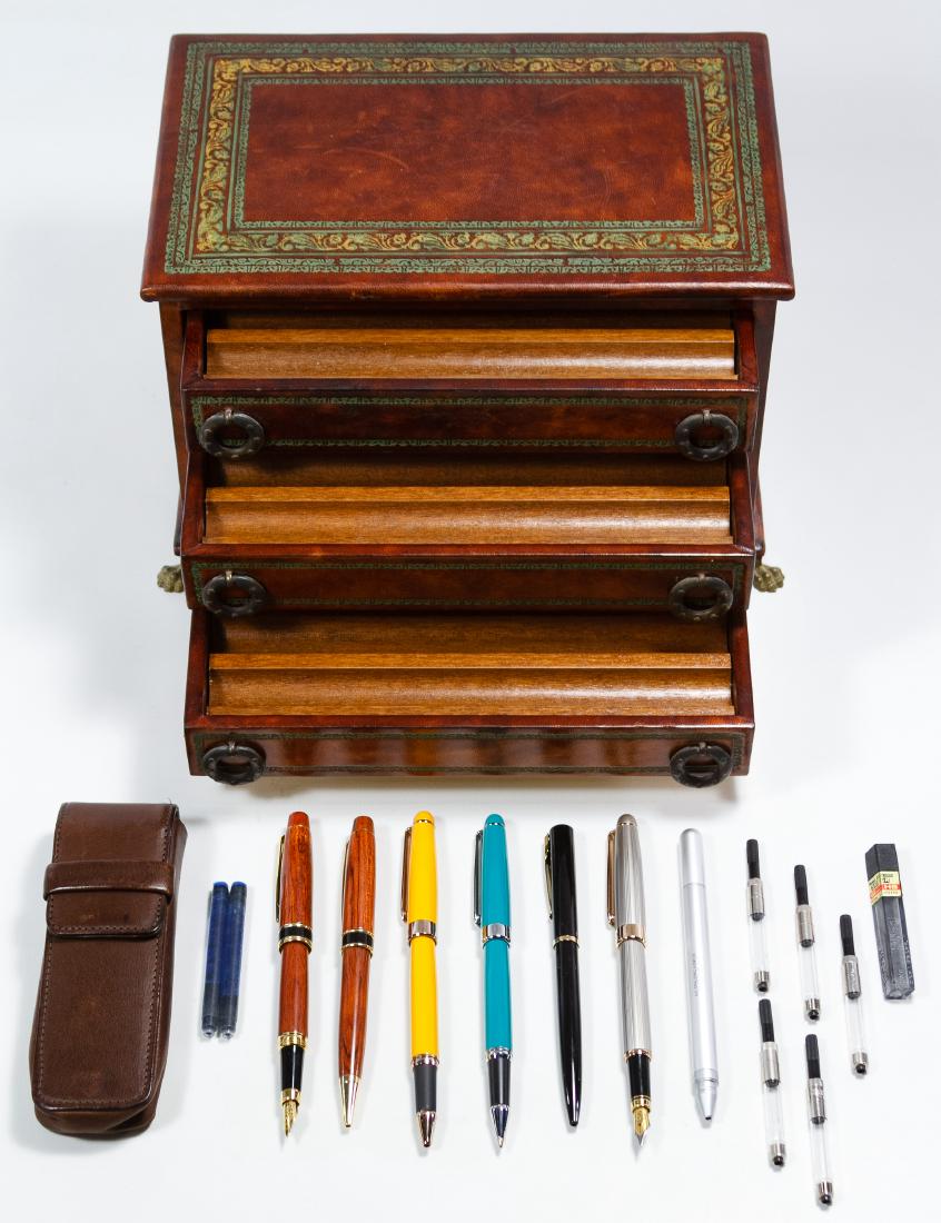 Pen and Pen Holder Assortment: Pen and Pen Holder Assortment Including a 51 aqua ball point pen, a 51 yellow ball point pen, a 51 stainless steel fountain pen, an A.G. Spaulding & Brothers silver bullet pen, a coach leather pen hol
