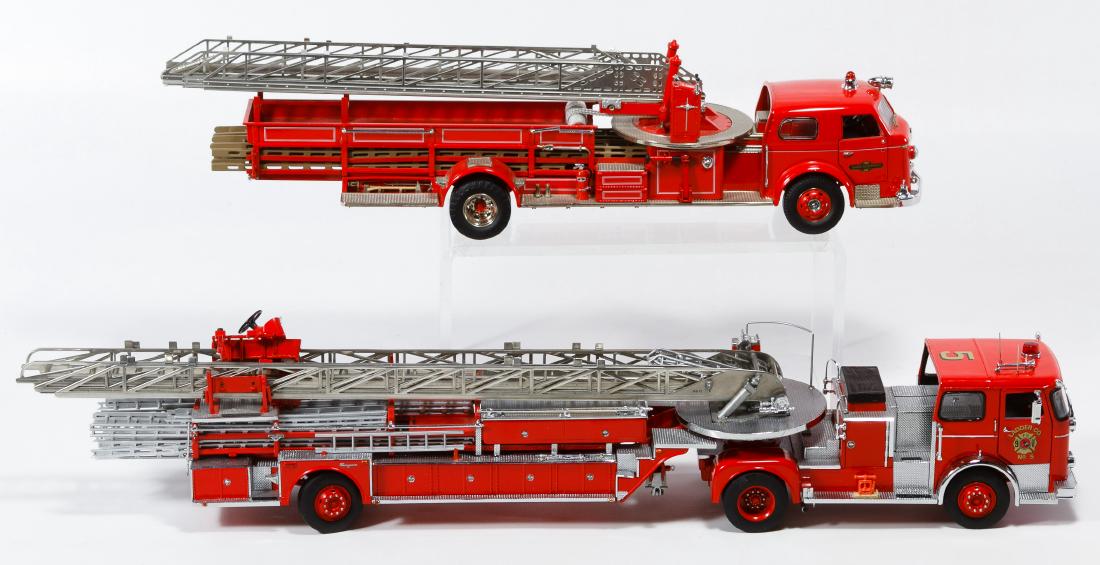 Franklin Mint Fire Engine Model Trucks: Franklin Mint Fire Engine Model Trucks Two engines including a series 700 engine and a 1965 Seagrave Aerial Ladder Truck; both have original boxes and COAs Length: 16.00 inches (longest) Category: Col
