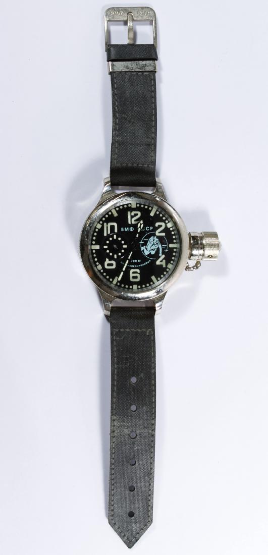 Soviet Russian Diver's Watch: Soviet Russian Diver's Watch Having a 700M mark on the face, #1624 at back, glow in the dark numbers and a cover over the self-winding stem Length: 12.00 inches Category: Watches > Men's Wrist Watches