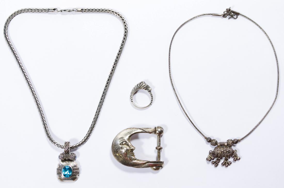 Sterling Silver Jewelry Assortment: Sterling Silver Jewelry Assortment Including Kieselstein Cord moon belt buckle, a ring signed 'Judith Leiber' and two necklaces; all marked '925' or 'sterling' Width: 2.00 inches (belt buckle) Weight: