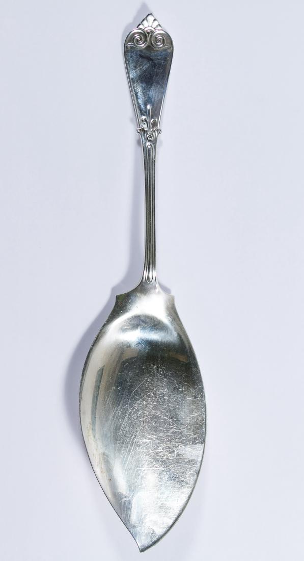 Tiffany & Co 'Tiffany' Sterling Silver Serving Utensil: Tiffany & Co 'Tiffany' Sterling Silver Serving Utensil Large solid ice cream server; marked 'sterling' and 'Tiffany & Co' on back Length: 11.00 inches Weight: 3.38 ozt. Category: Silver & Metalware > 