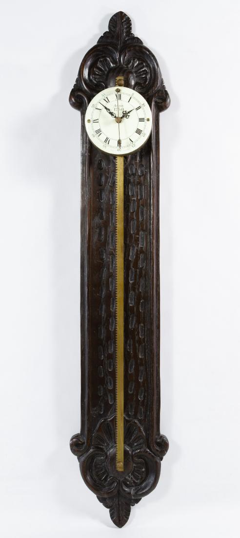 Colonial Manufacturing Co. Saw Clock: Colonial Manufacturing Co. Saw Clock Model #120 having a German clock movement Height: 26.00 inches (clock) Category: Decorative Arts > Clocks Shipping Status: Leonard Auction, Inc. will provide direc