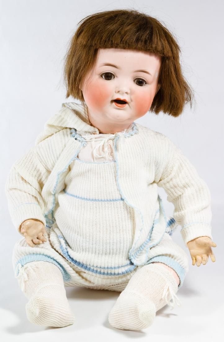 Cuno, Otto & Dressel Bisque Baby Doll: Cuno, Otto & Dressel Bisque Baby Doll Having a bisque socket head, five piece composition bent limb body with crier in torso, glass sleep eyes and a human hair wig Height: 24.00 inches Category: Colle