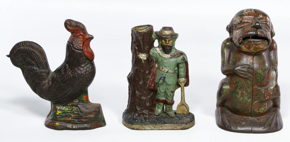 Mechanical and Still Bank Assortment: Mechanical and Still Bank Assortment Three items including a 'General Butler' still frog man bank, a 'Captain Kidd' still bank and a mechanical rooster bank Height: 7.00 inches (general butler) Catego
