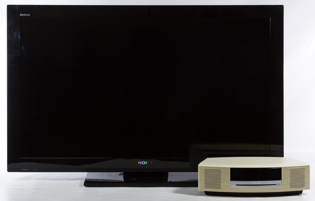 Sony Bravia Flat Screen TV and Bose Wave Music System: Sony Bravia Flat Screen TV and Bose Wave Music System Sony model No.KDL-40BX421 and serial No.3024069, forty-inch screen, includes remote and instructions; Bose model No.AWRCC2 and serial No.033976C43