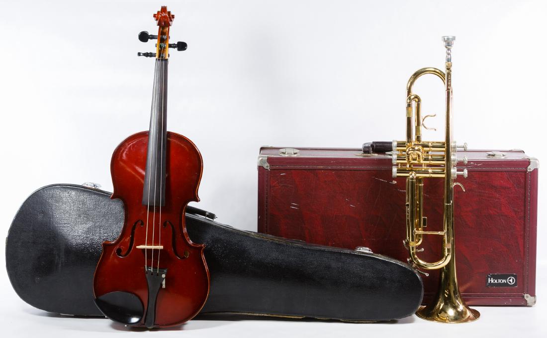Frank Holton Model T602P Trumpet with Case: Frank Holton Model T602P Trumpet with Case Serial #955763; together with a violin and case Height: 12.00 inches, Width: 21.75 inches (trumpet case) Category: Cameras & Instruments > Brass Instruments 