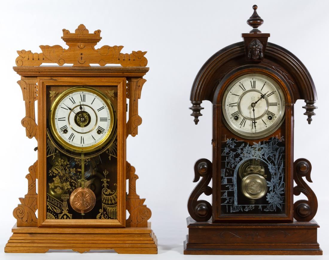 Mantel Clock Assortment: Mantel Clock Assortment Four clocks with examples from Seth Thomas and Waterbury Clock Co.; together with an hour glass and key chain clock; wood mantel clocks having keys and pendulums Height: 23.00
