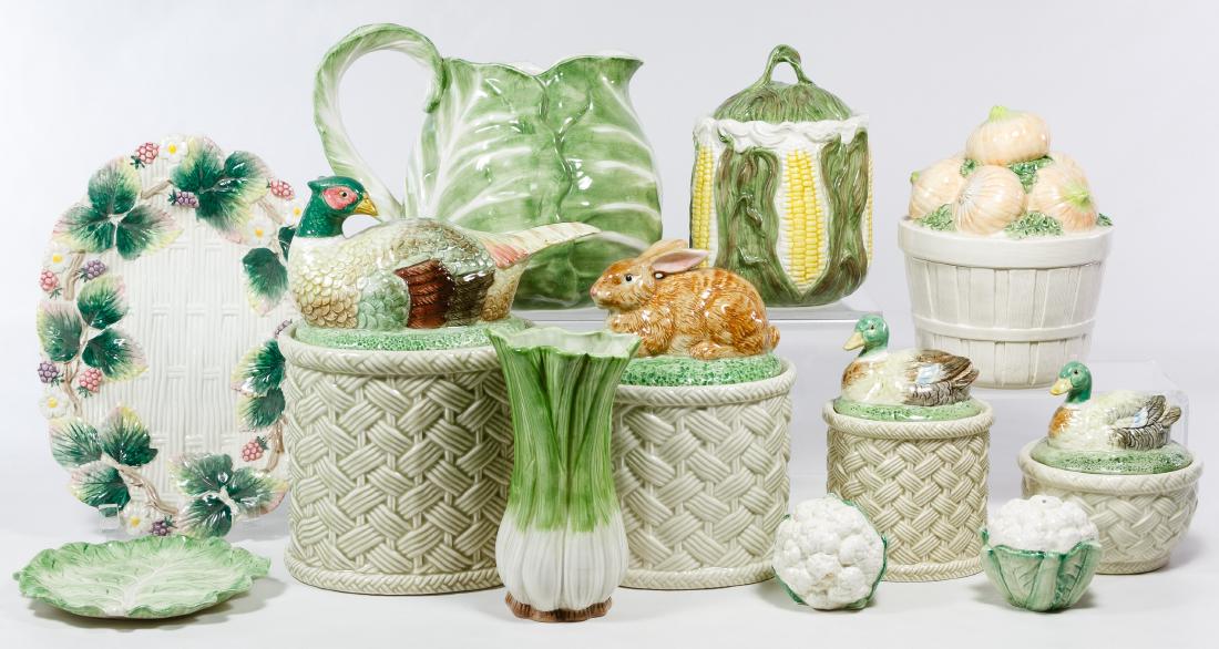 Fitz and Floyd Ceramic Assortment: Fitz and Floyd Ceramic Assortment 1988-1990; twelve items including a four canister set of 'Autumn Leaves' with game animal finials, a cabbage leaf pitcher, a plate and two shakers, a leek vase, a cor