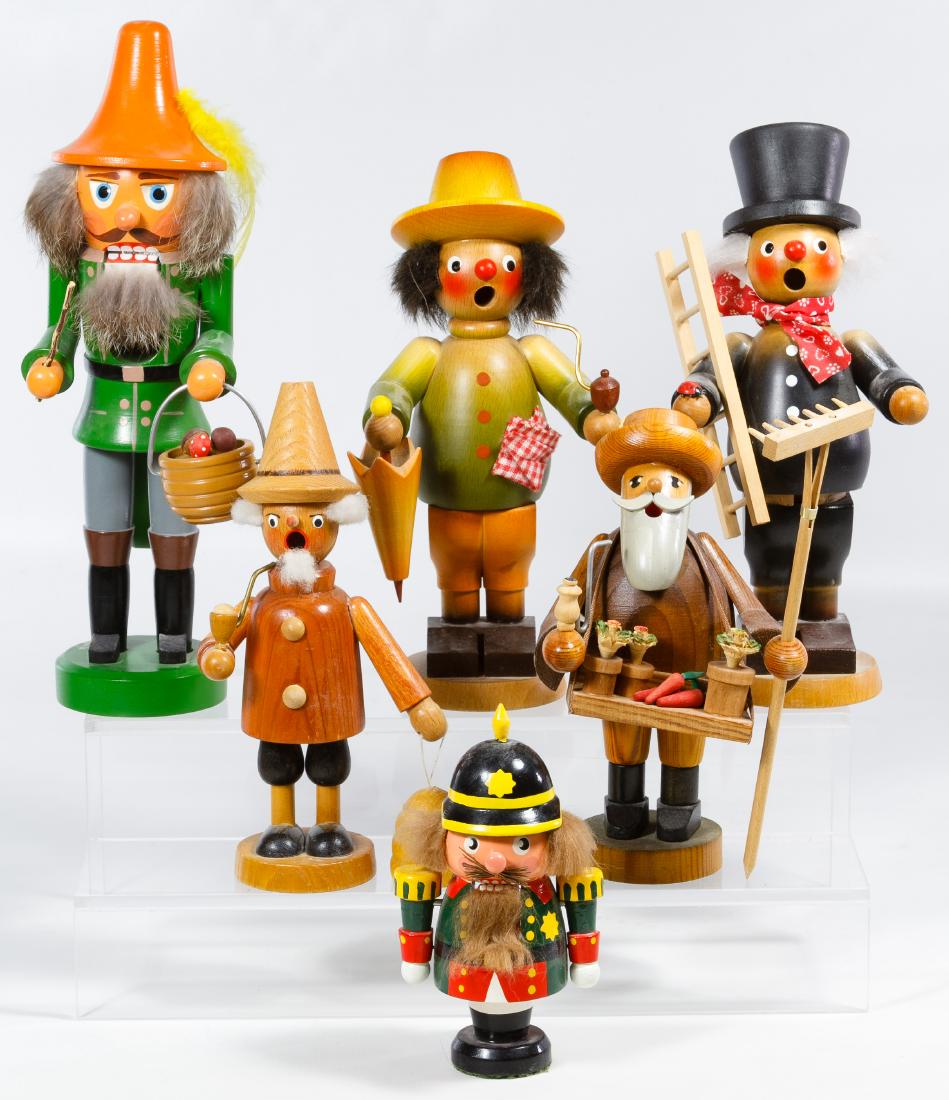 German Wood Figurine Assortment: German Wood Figurine Assortment Including two nutcrackers and four incense burner / smoker figurines Height: 11.00 inches (tallest) Category: Collectibles > Holiday Shipping Status: Leonard Auction, I