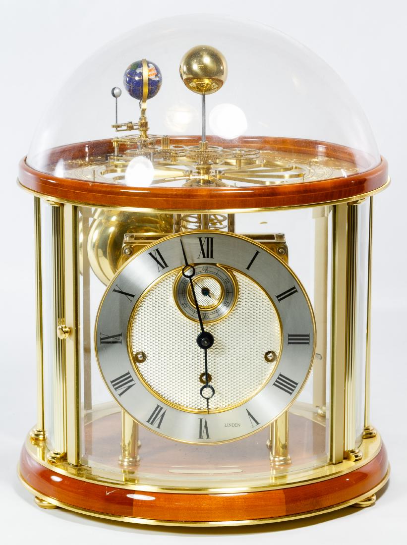 Hermle Linden Tellurium Limited Edition Mantel Clock: Hermle Linden Tellurium Limited Edition Mantel Clock 11-jewel movement, number 082/100, serial #352-070 SK; including key Height: 14.00 inches, Diameter: 10.50 inches Category: Decorative Arts > Clock
