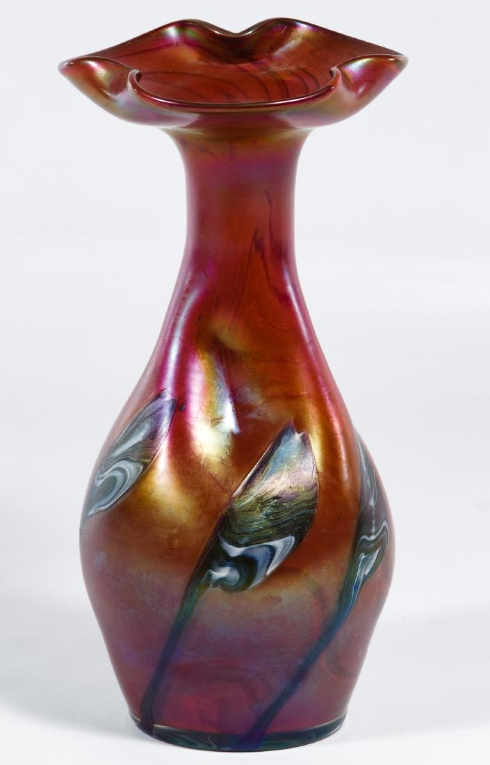 Rindskof Art Glass Vase: Rindskof Art Glass Vase Unmarked, having a ruffled edge Height: 9.00 inches Category: Crystal & Glass > Art Glass Shipping Status: Leonard Auction, Inc. will provide direct shipping for this lot.