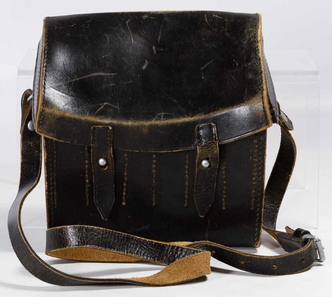 World War II German Leather Flare Case: World War II German Leather Flare Case Black leather, marked 'M.d.j.' and 'Liefere Nr. 1828' on the inside Height: 8.00 inches, Width: 8.50 inches Category: Military & Weapons > World War II Shipping 