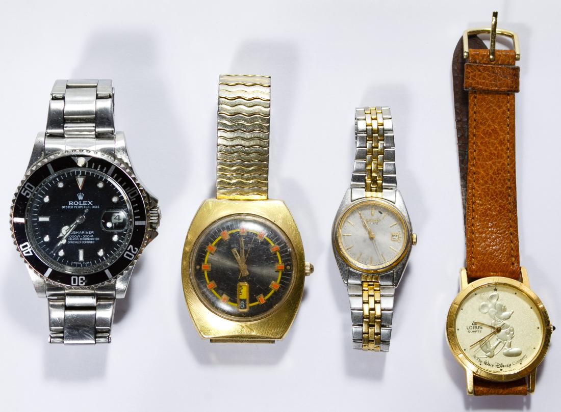 Wrist Watch Assortment: Wrist Watch Assortment Four watches including Jubilee Automatic, faux Rolex 'Sunmariner' automatic, Seiko and Lorus 'Mickey Mouse' Length: 5.75 inches (Lorus adjustable to 7.5) Category: Watches > Mix