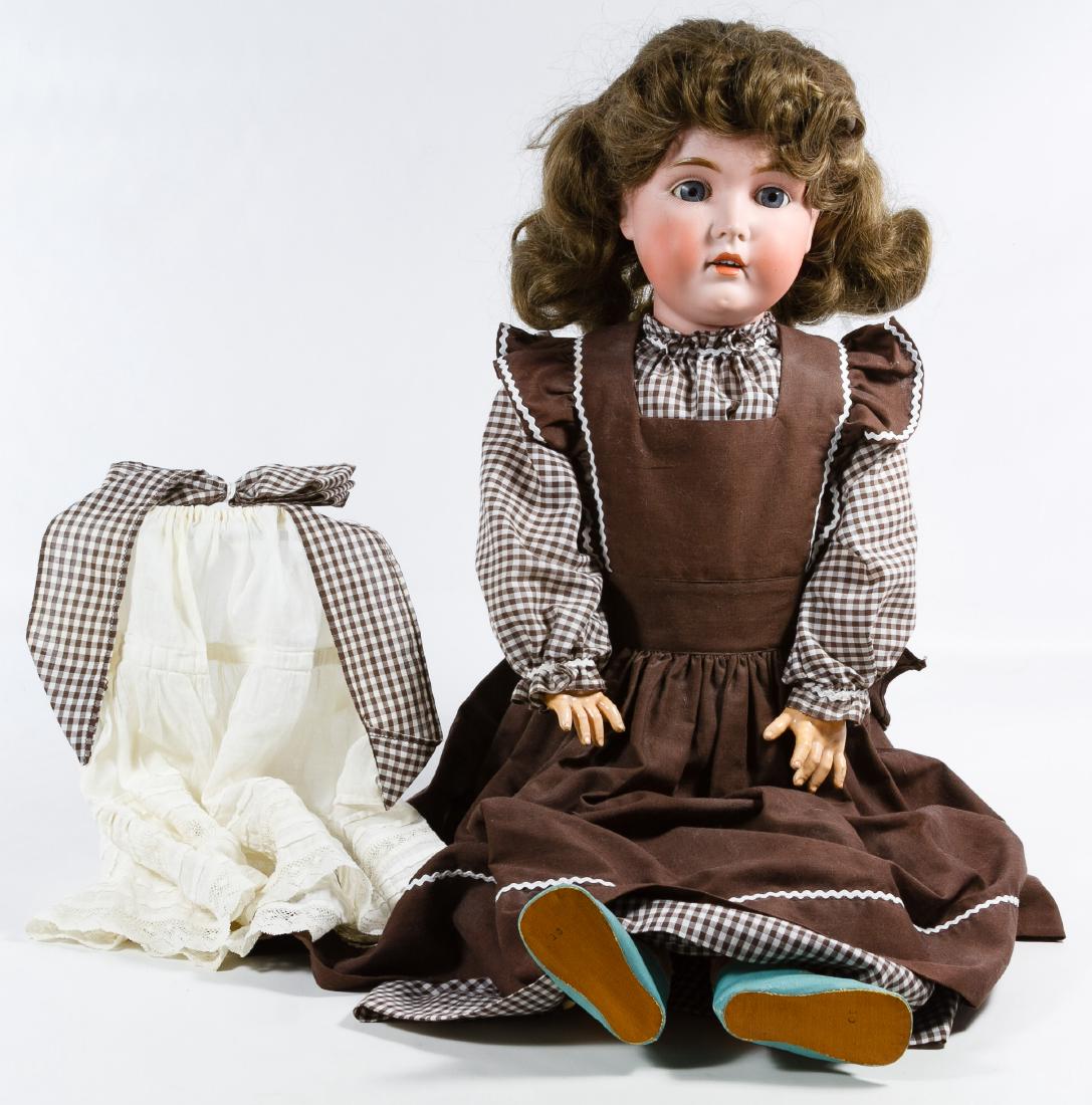 Kestner 171 German Bisque Doll: Kestner 171 German Bisque Doll Having a bisque socket head with glass sleep eyes, open mouth, teeth and tongue on a composition ball jointed body with modern clothes Height: 30.00 inches Category: Col